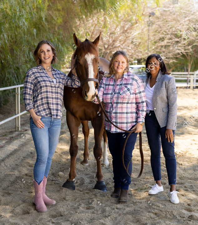 Hallmark executive Lisa Hamilton Daly and Erin Krakow on the set of When Calls the Heart